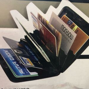 Hard shell card wallet fits atleast 10-12 cards